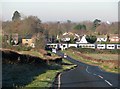 A train at Harston Level Crossing