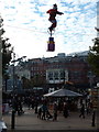SZ0891 : Bournemouth: Santa unicycles over The Square by Chris Downer
