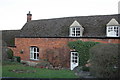 House at the NW end of the village