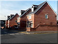 Four modern houses on the south side of Prince Road, Kenfig Hill