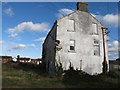 Side view of the former derelict Coastguard Station at Annalong