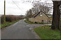 Road to Oxlynch passes Standish Villa Farm, Stroud Green