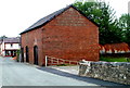 The writing on the wall of a warehouse, Llandovery