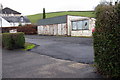 Tired garages by the Maybole road