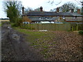 Farm track by cottages on the A27 west of Arundel