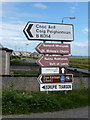 NB5363 : Port of Ness: signpost on the B8014 by Chris Downer