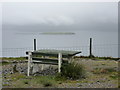 NB1004 : Miavaig: picnic table and Iosaigh view by Chris Downer
