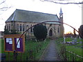 TL2691 : The entrance to St Thomas' Church at Pondersbridge by Richard Humphrey