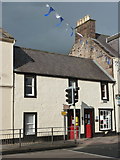 NS7809 : Sanquhar: the post office from across the road by Chris Downer