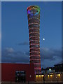 Olympic torch structure at dusk, High Street, Stratford