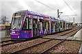 London Tramlink Stadler tram no. 2554 entering Therapia Lane tram stop, Croydon