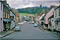 SS9943 : Dunster: High Street and view to the Yarn Market and  Castle, 1963 by Ben Brooksbank