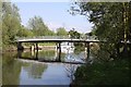 SP5301 : Footbridge over the backwater by Steve Daniels