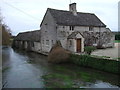 SU1799 : Cottage beside River Coln, Whelford by Vieve Forward