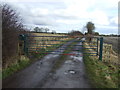 Gated track to Glebe Farm