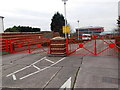 Red entrance gates to Cardiff and Vale College, Barry