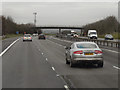 SP3556 : Northbound M40, Footbridge at Checkleys Brake by David Dixon