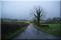 Approaching the A487 on a wet evening