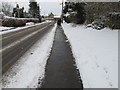 SE6184 : Pavement and road cleared of snow, Helmsley by David Hawgood