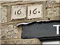 Datestone  above the window of the Sweet Shop, The Square, Corfe Castle