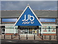 SJ3563 : 'jjb sports', Broughton? by John S Turner