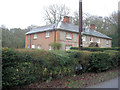 Imposing house and telegraph pole beside Hamptworth Road