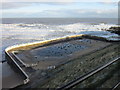 NZ3769 : A disused Lido at Long Sands beach by Ian S