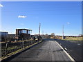 The level crossing near Wembley Gardens (road)