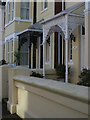 Cast iron filigree porches