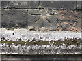 Bench mark and bolt on All Saints