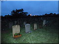 Milford on Sea- All Saints,  Churchyard at twilight (g)