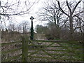TL3283 : Stone cross next to Old Fen School, Warboys by Richard Humphrey