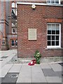 Wreaths under the plaque