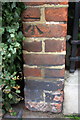 Benchmark on wall of Hamston House, Kensington Court Place