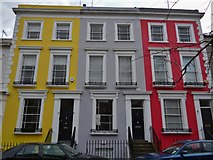 TQ2480 : Brightly painted houses, Denbigh Terrace W11 by Robin Sones