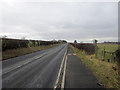 NT9650 : Looking along the A698 near Longridge by Graham Robson