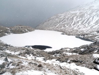 NY4509 : Frozen Small Water in the snow by Anthony Parkes