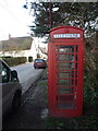 Iwerne Courtney: phone box on Main Street