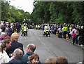 The Olympic Torch police escort approaches Ankle Hill/Warwick Road/Sandy Lane junction