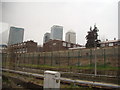 View of Canary Wharf from the DLR outside Bow Church station