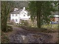 SX8876 : Bridge and cottage, Ideford Combe by Derek Harper