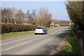 SJ3362 : Main Road approaching Lower Kinnerton by Jeff Buck