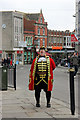 Town crier in full voice - Northgate Street, Gloucester