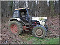 Old tractor beside the lane