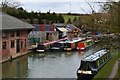 Moored narrowboats on the Grand Union Canal at Blisworth