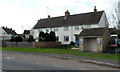 Phonebox, bus shelter and houses, Kemble