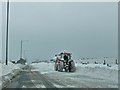 Digger clearing snowdrifts A682