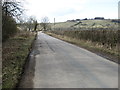 NY3139 : The B5299 west of Caldbeck by David Purchase