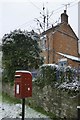 Postbox and house