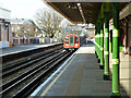 Central Line train arriving at Fairlop